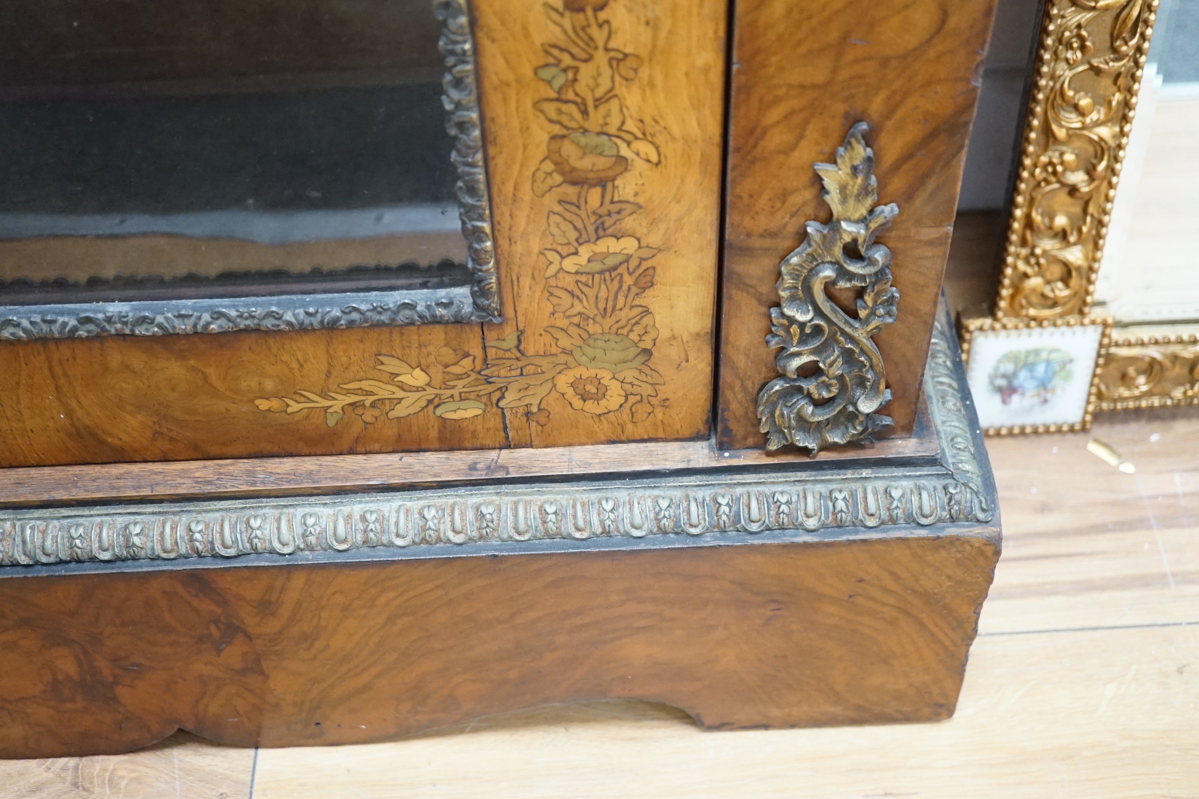A pair of Victorian gilt metal mounted marquetry inlaid walnut pier cabinets, width 83cm, depth 31cm, height 115cm